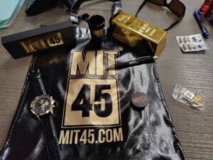 A set of items branded with MIT45 logo.