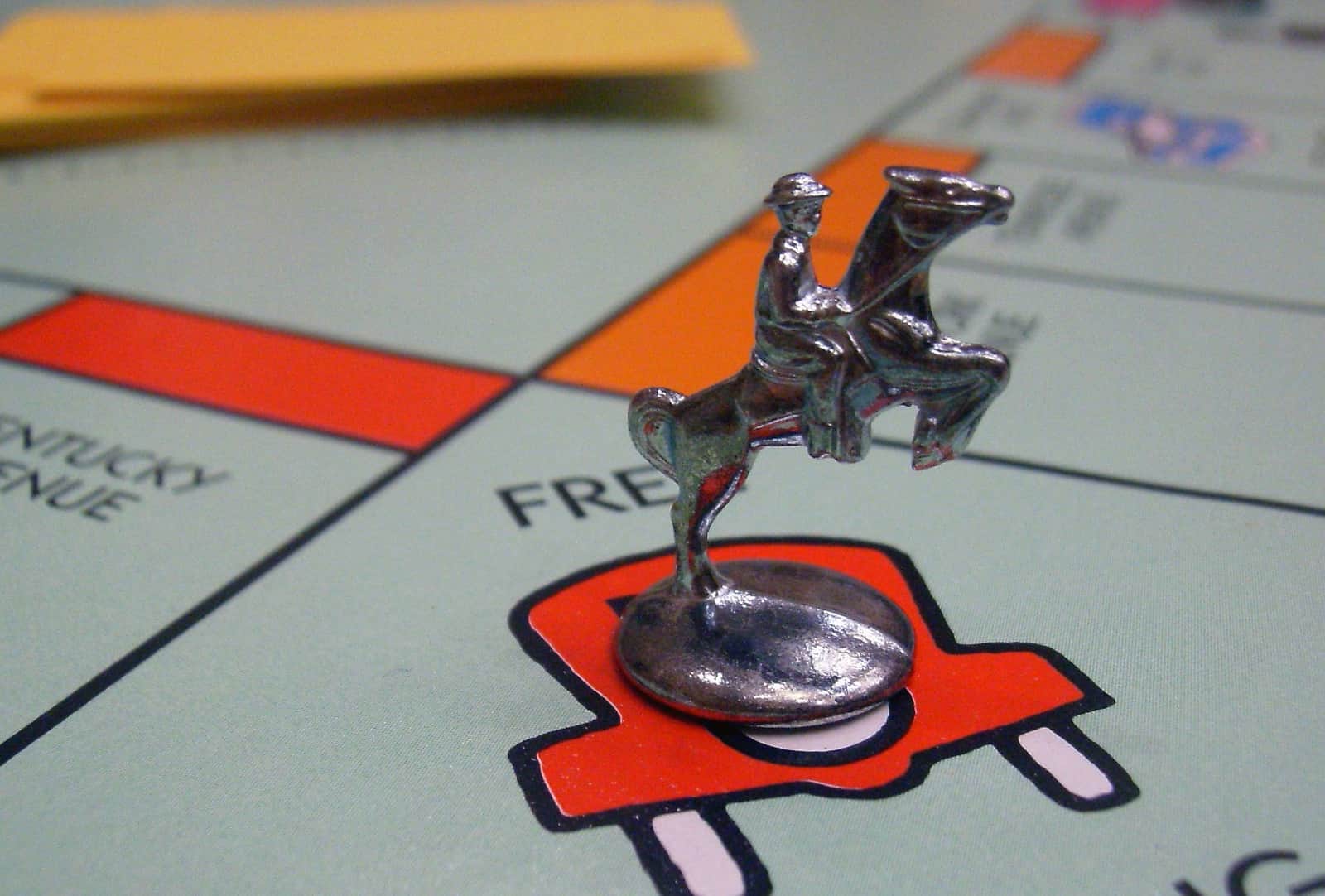 Monopoly horse and rider piece on Free Parking space