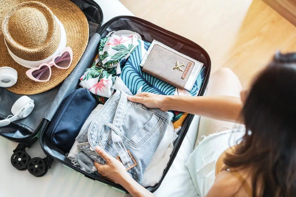 Woman packing her suitcase