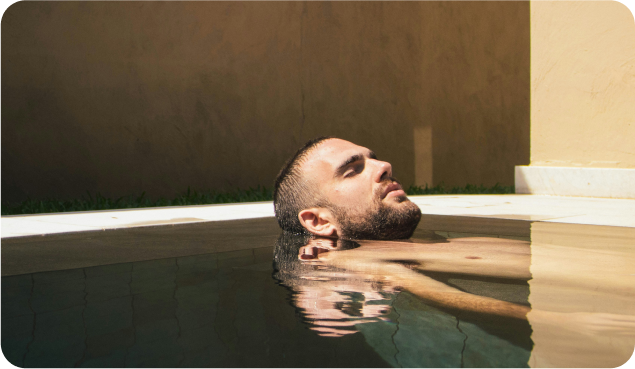 Man chilling in the pool