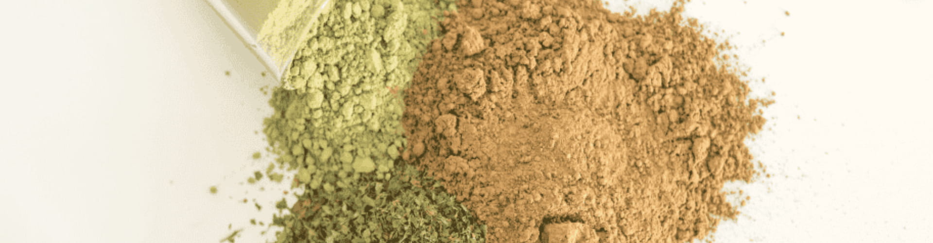 Red, green, and white kratom powder