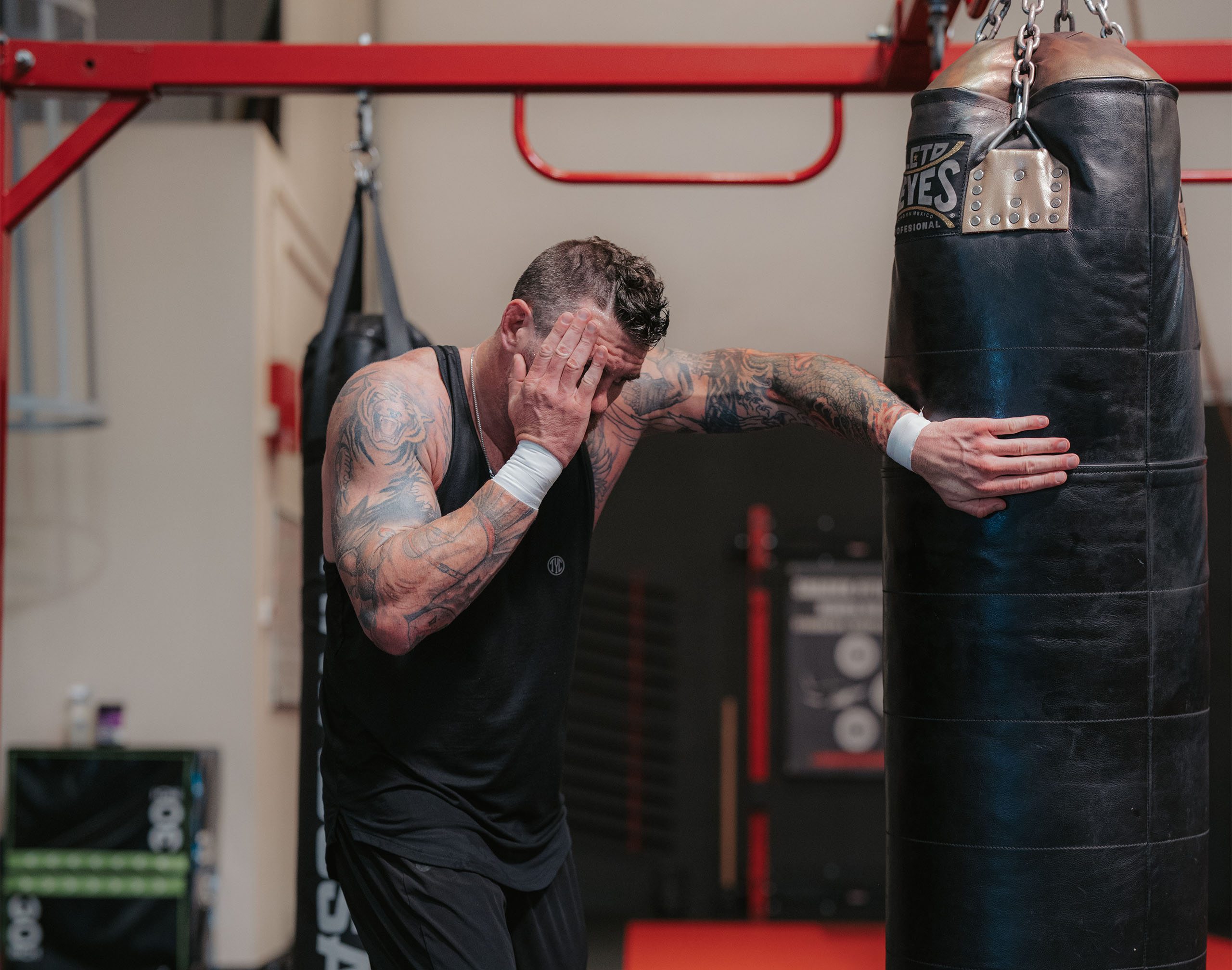 Chris Camozzi working with the punching bag