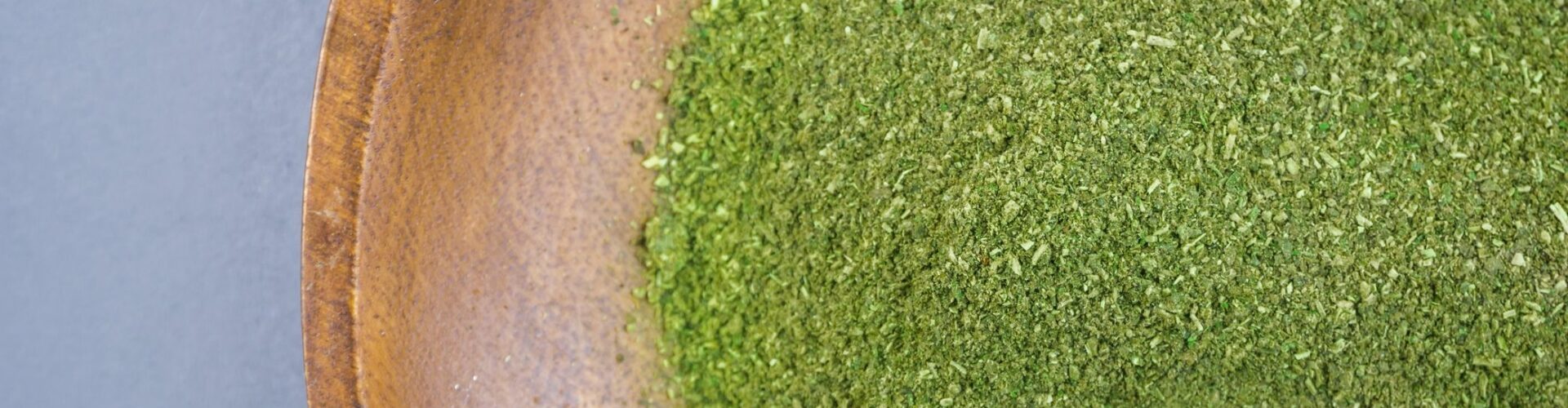 A plate filled with Kratom powder.