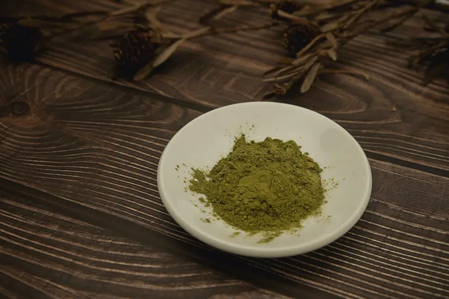 A small bowl of kratom powder