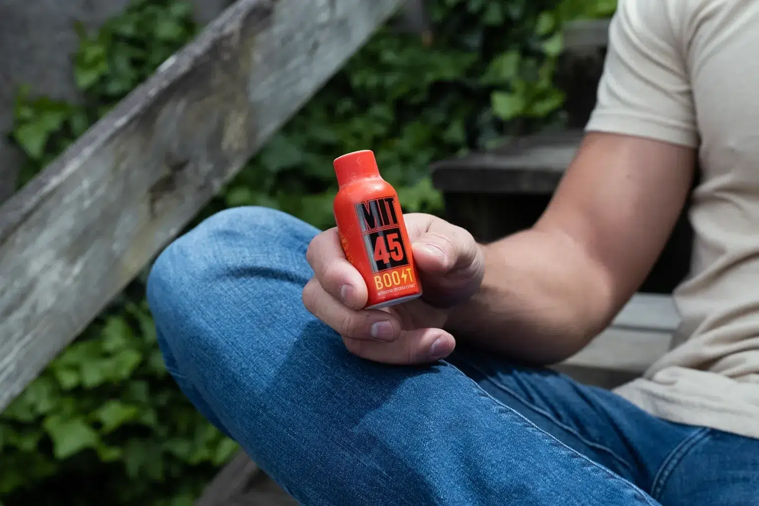 Man holding Boost shot in garden